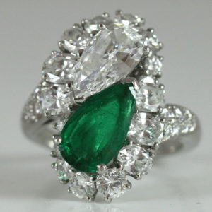 1.30ct Pear Shaped Diamond and emerald twin antique platinum ring
